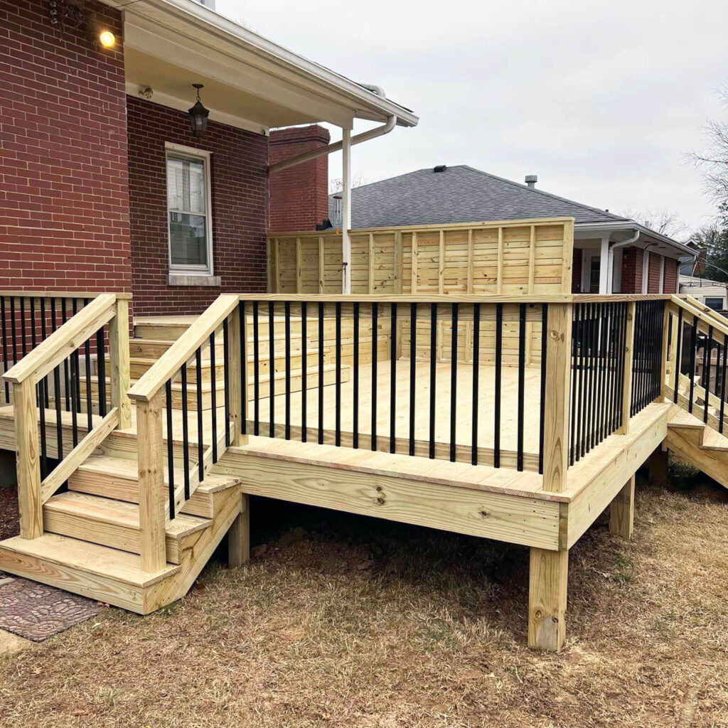 custom-deck-build-outside-of-a-brick-house