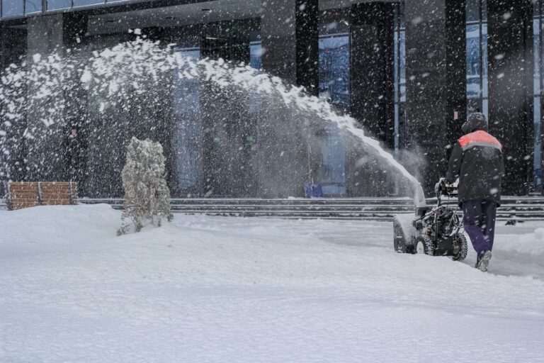 man-in-snow-with-leaf-blower