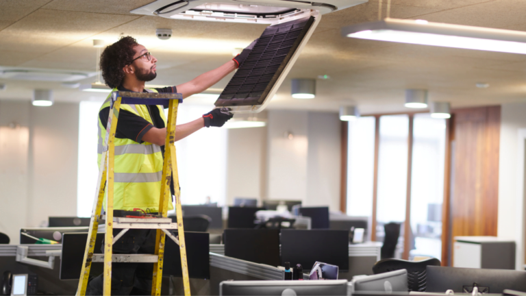 man-changing-filter-in-commercial-property