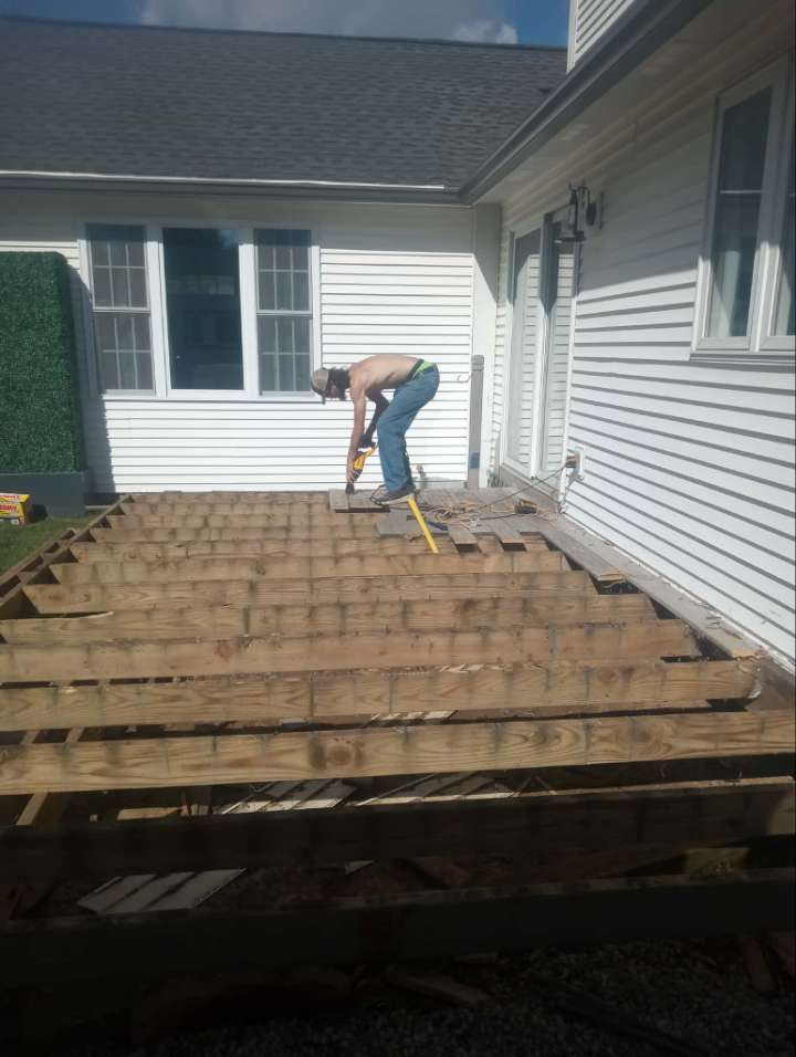 tearing-down-old-deck-joists-to-install-a-new-deck